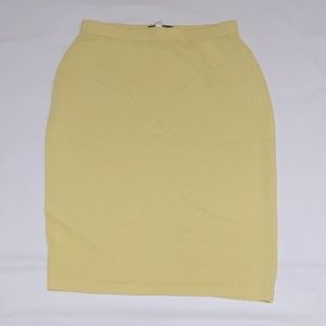St. John Collection Knit Skirt. Yellow. 15 inch across waist and 24.5 length.